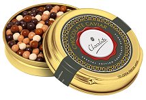 Mixed chocolate pearls in a gold caviar tin