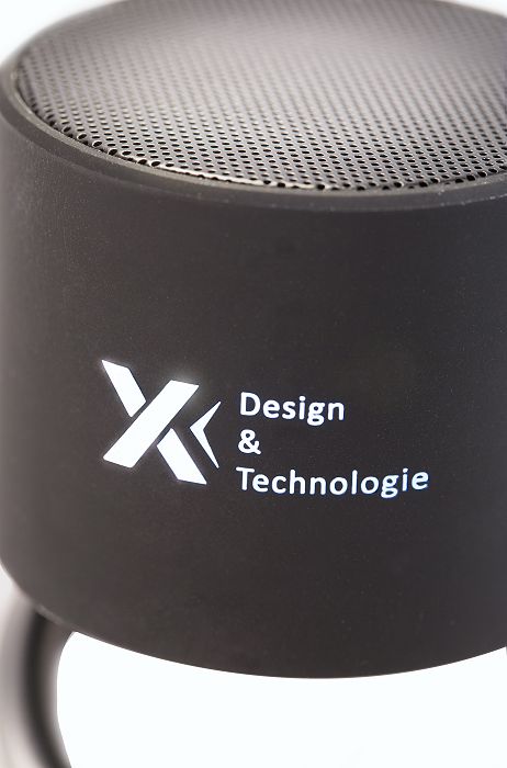 LED logo Bluetooth speaker close up of logo